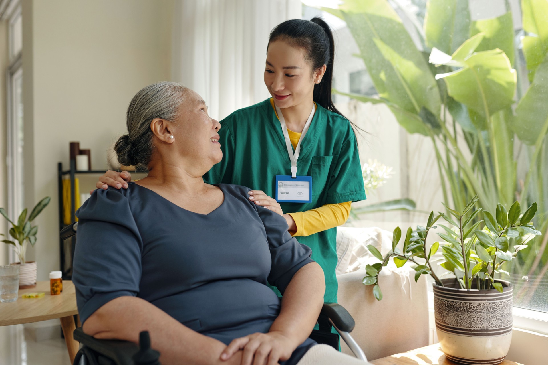 Social Worker Caring About Senior Woman